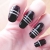 Un nail-art avec le noir ELF